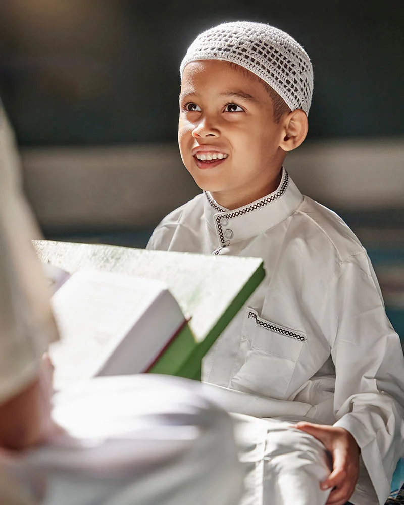 Children learning Qur'an recitation at Makkah Centre